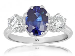 18ct white gold ladies ring set with 1x2.13ct Oval shape Ceylon Sapphire and 2=.71ct round brilliant cut diamonds.
