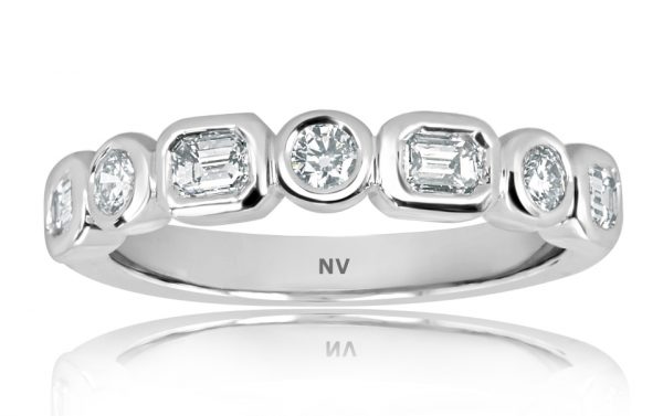 18ct white gold ladies ring set with 4=.44ct Emerald cut diamonds and 3=.19ct round brilliant cut diamonds,