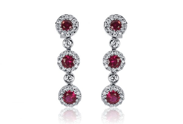 18ct White Gold Ladies Drop Design Earrings set with 6=.94ct Natural Rubies and 76=.37ct round Brilliant cut Diamonds. $1700.00