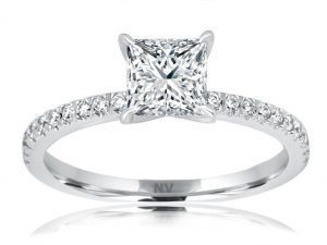 18ct White Gold Ladies engagement ring set with 1x1.03ct Princess cut Diamond, Colour F, Clarity P1 and 22=.20ct round brilliant cut diamonds in fine claw setting.