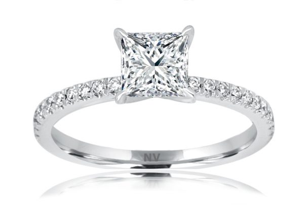 18ct White Gold Ladies engagement ring set with 1x1.03ct Princess cut Diamond, Colour F, Clarity P1 and 22=.20ct round brilliant cut diamonds in fine claw setting.