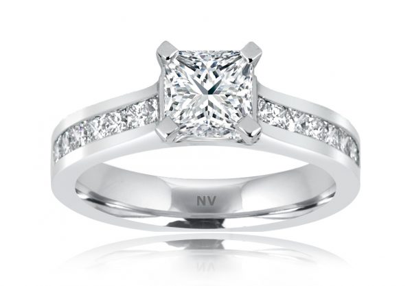 18ct White Gold Ladies engagement ring set with 1x1.05ct Radiant cut Diamond, GIA Certified Colour F, Clarity SI1 and 16 princess cut diamonds in channel settings.